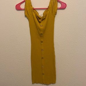 A mustard yellow body-con on off the shoulder dress. Only worn once